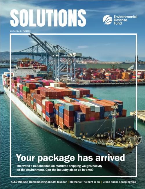 The fall 2023 cover of Solutions magazine which features a large ship loaded with containers and the headline "Your package has arrived"