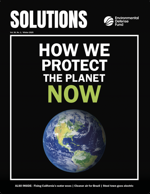 The Solutions magazine cover with "How we protect the planet now" on it and shot of the Earth