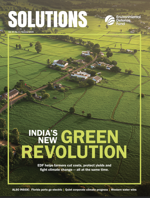 The summer issue of Solutions titled India's new green revolution with green Indian farmland in the background