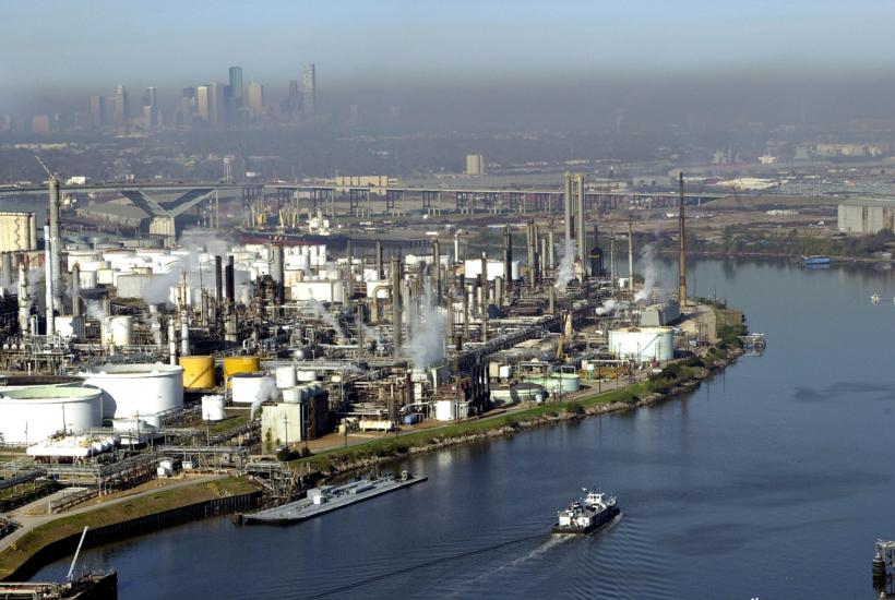 An aerial view of the Houston Ship Channel with petrochemical facilities lining the shores